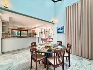 Modern dining area with natural light and stylish decor