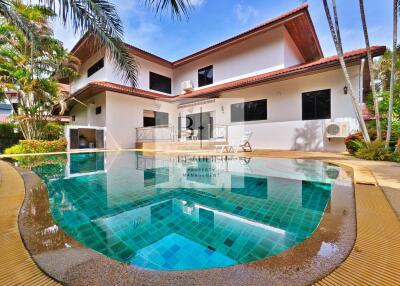 beautiful house with a private pool and tropical garden