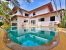 beautiful house with a private pool and tropical garden