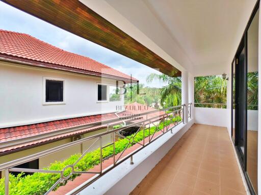 Spacious balcony with a view of neighboring house