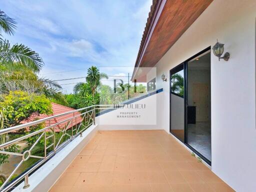 Spacious balcony with a view and sliding glass door