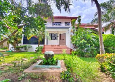 Exterior view of a house with a garden