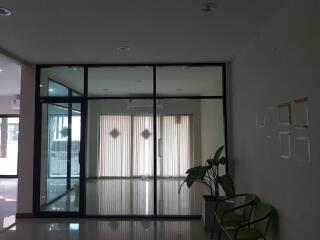 Main living area with floor-to-ceiling windows