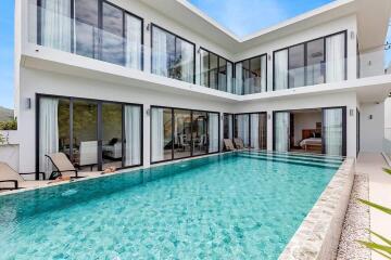 Modern two-story house with a large swimming pool