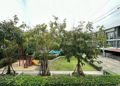 View of the communal garden and playground area