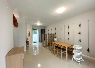 Minimalist living and dining area with natural light