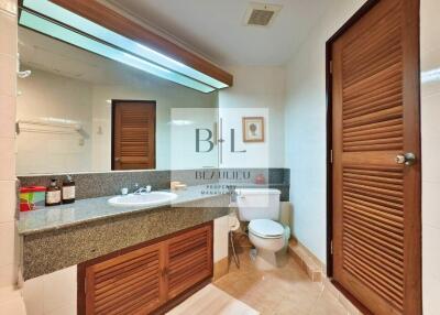 Modern bathroom with wooden fixtures