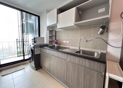 Modern kitchen with balcony view