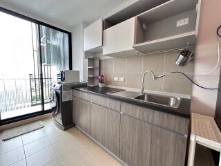 Modern kitchen with balcony view