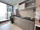 Modern kitchen with balcony view