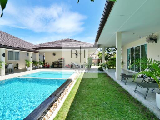 Outdoor area with swimming pool and garden