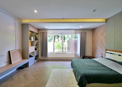 Spacious bedroom with natural lighting