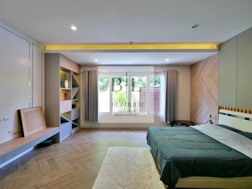 Spacious bedroom with natural lighting