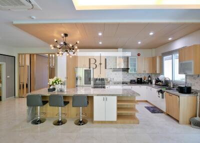 Modern kitchen with island and bar stools