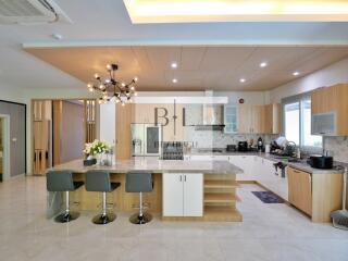 Modern kitchen with island and bar stools