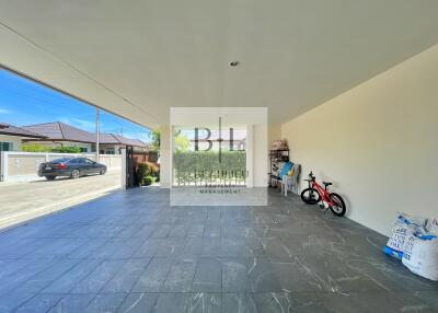 spacious garage with tiled flooring