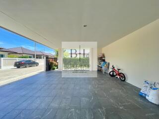 spacious garage with tiled flooring