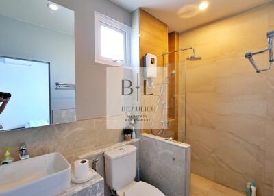 Modern bathroom with shower and vanity