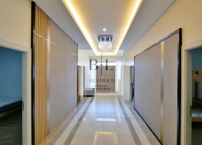 Modern hallway with bedroom entrances