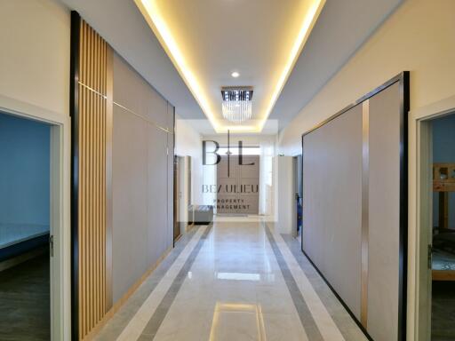 Modern hallway with bedroom entrances