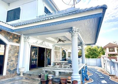 Front view of a building with a spacious porch