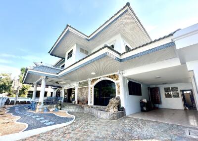 Front view of a house with a unique architectural design