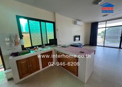 Kitchen with adjacent living area