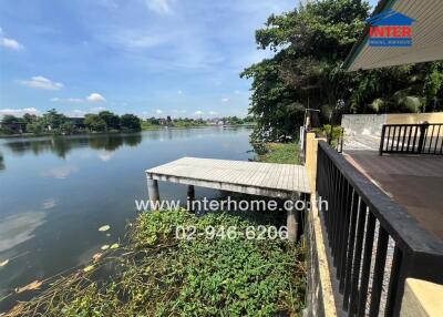 Scenic outdoor view of a riverside with dock