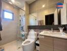 Modern bathroom with glass shower and vanity