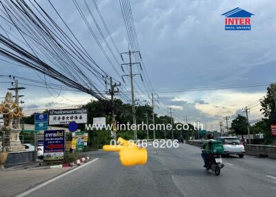 Street view with traffic and advertisements