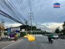 Street view with traffic and advertisements