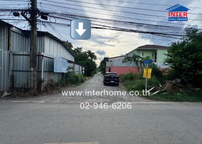 Street view with buildings and a parked car