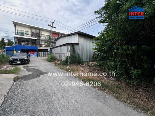 Entrance road leading to a property