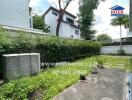 Outdoor garden area with pathway and greenery