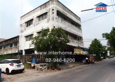 Street view of a multi-storey residential or commercial building