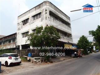 Street view of a multi-storey residential or commercial building