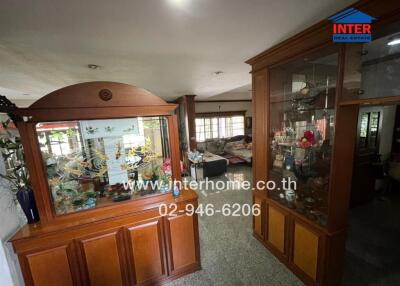 Spacious living room with decorative wooden cabinet