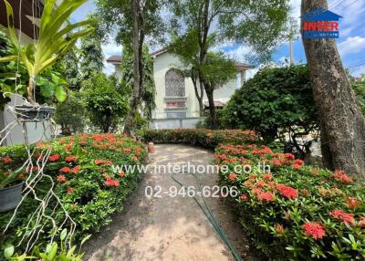 Garden path leading to a residential building