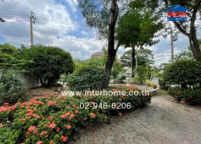 Beautiful garden with pathway and lush greenery