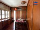 Bedroom with wooden furniture and windows