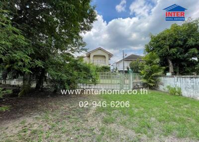 Front view of the house with garden