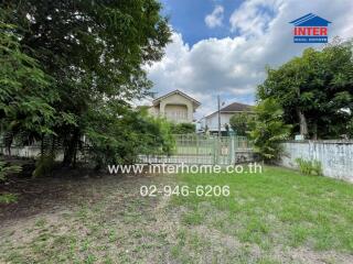 Front view of the house with garden