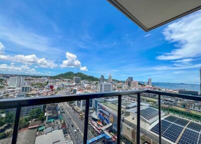 Balcony view of city with blue sky