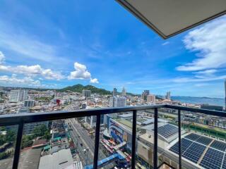 Balcony view of city with blue sky