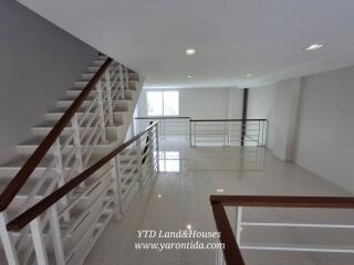 Staircase and hallway inside a multi-level building