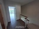 Interior hallway with view into another room and window