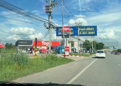 Street view with various stores and power lines