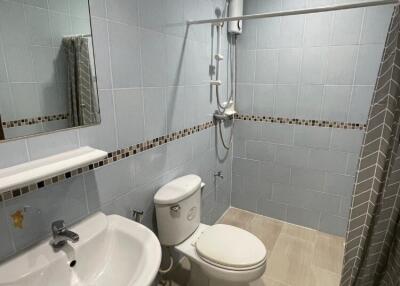 Well-lit bathroom with modern fixtures