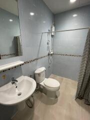 Well-lit bathroom with modern fixtures