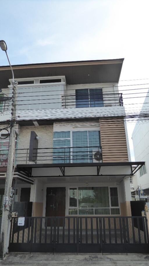 Three-story residential building exterior